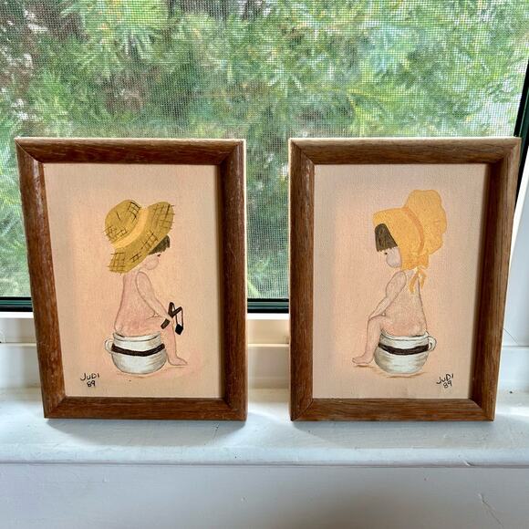Vintage Framed Paintings Boy And Girl on Chamber Pots, set of 2 - Picture 1 of 11
